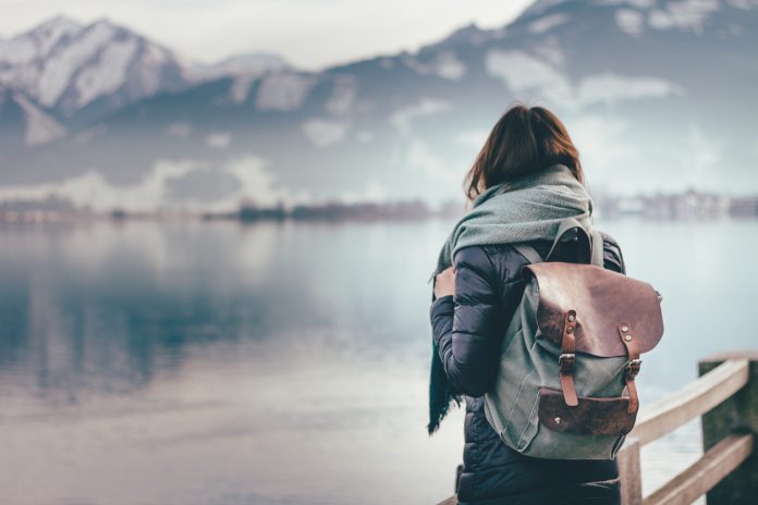 Traveler looks at landscape