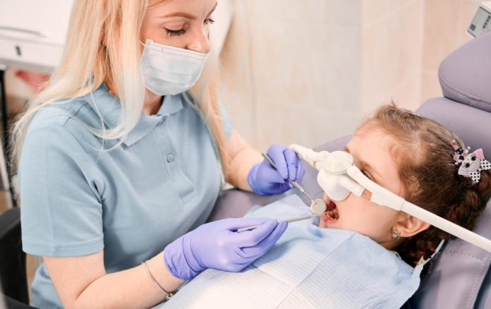 Child with dental anxiety receiving Pediatric Sedation Dentistry in Fremont