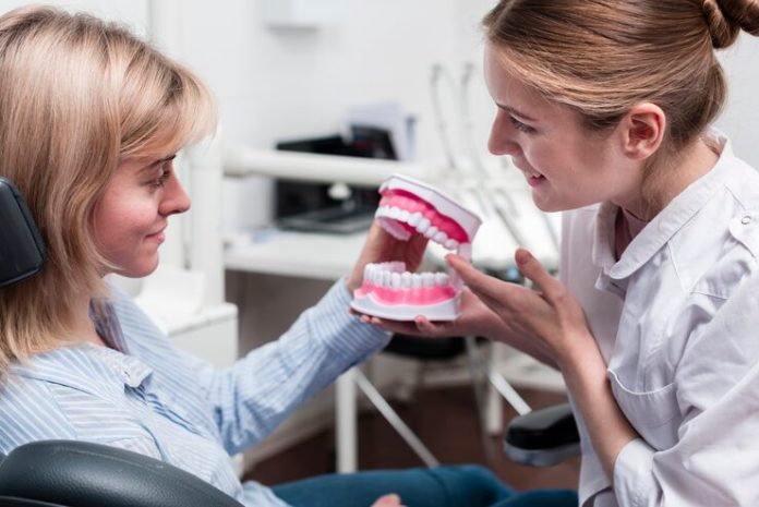 Dental Implants Versus Dentures Dental Implants Versus Dentures